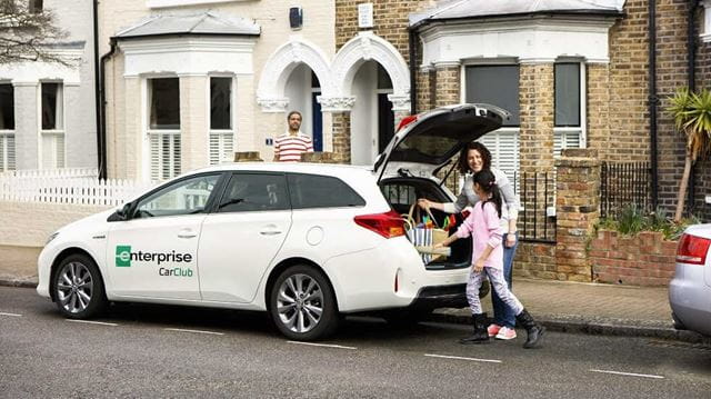 Enterprise rental car being loaded